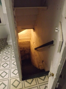 The stairwell leading to the basement.